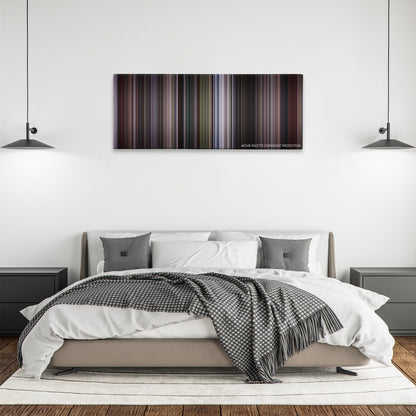 The Jackal color palette canvas above a bed, between two black pendant lamps