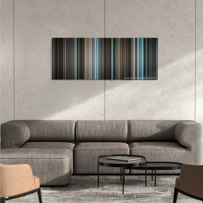 Men in Black II color palette canvas on a concrete wall above a gray sectional sofa