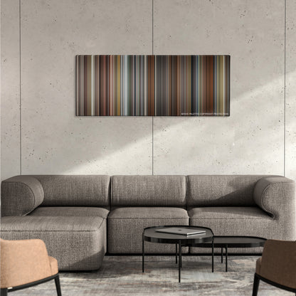 The Fault in Our Stars color palette canvas on a concrete wall above a gray sectional sofa