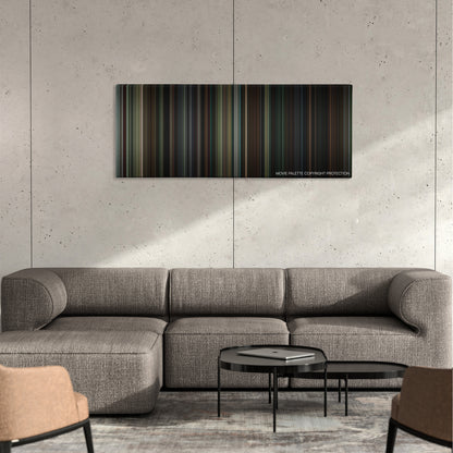 The Skeleton Key color palette canvas on a concrete wall above a gray sectional sofa