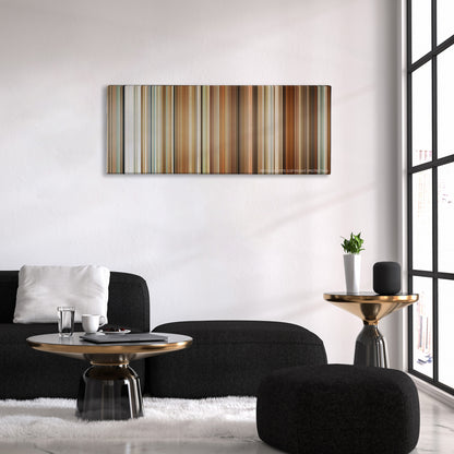 The Holiday color palette canvas above a black sofa with a gold-topped table