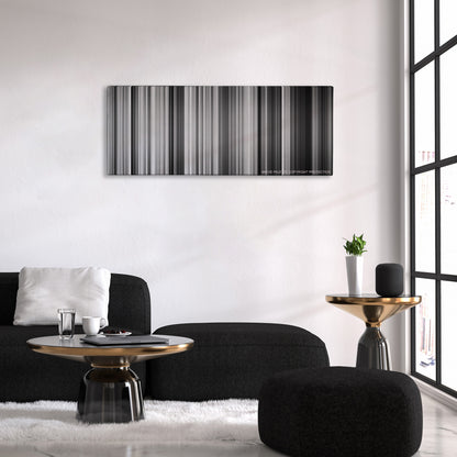 La Haine color palette canvas above a black sofa with a gold-topped table