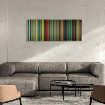 Push color palette canvas on a concrete wall above a gray sectional sofa