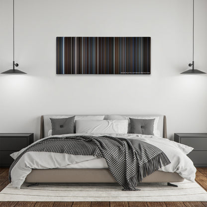 The Prestige color palette canvas above a bed, between two black pendant lamps