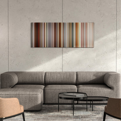 Precious color palette canvas on a concrete wall above a gray sectional sofa