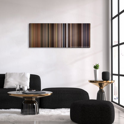 Willow color palette canvas above a black sofa with a gold-topped table