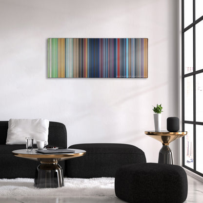One Hundred and One Dalmatians color palette canvas above a black sofa with a gold-topped table