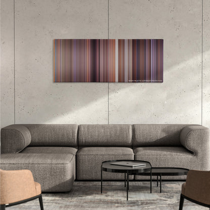 Meet the Parents color palette canvas on a concrete wall above a gray sectional sofa
