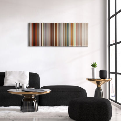 Precious color palette canvas above a black sofa with a gold-topped table