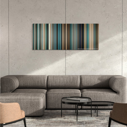 Lord of War color palette canvas on a concrete wall above a gray sectional sofa