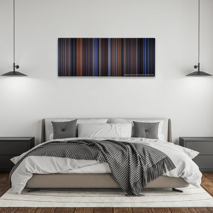 The Cable Guy color palette canvas above a bed, between two black pendant lamps