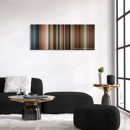 Patch Adams color palette canvas above a black sofa with a gold-topped table