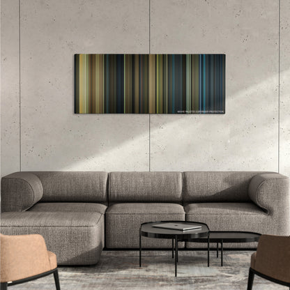 Real Steel color palette canvas on a concrete wall above a gray sectional sofa