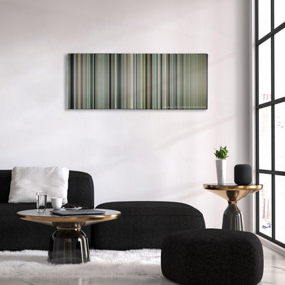 Invictus color palette canvas above a black sofa with a gold-topped table