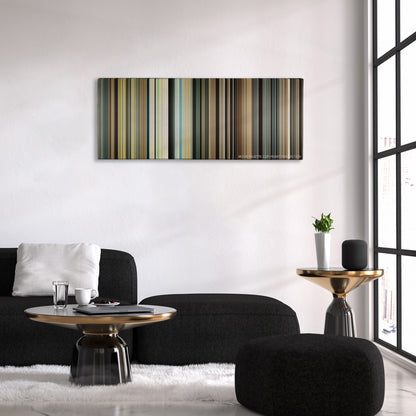 Unbroken color palette canvas above a black sofa with a gold-topped table