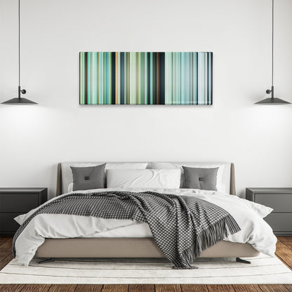 The Mountain II color palette canvas above a bed, between two black pendant lamps