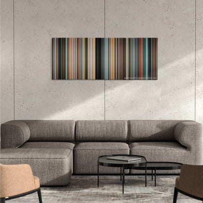 RED color palette canvas on a concrete wall above a gray sectional sofa