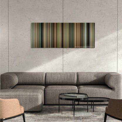 The Blind Side color palette canvas on a concrete wall above a gray sectional sofa