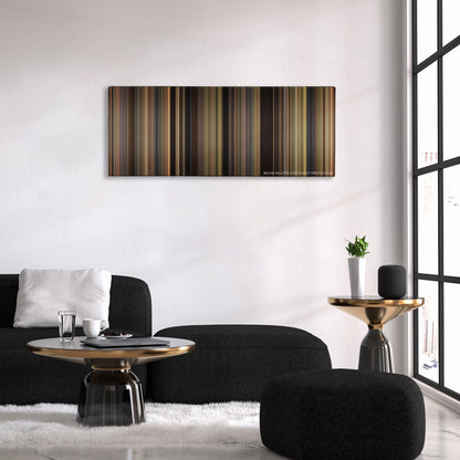 We Bought a Zoo color palette canvas above a black sofa with a gold-topped table