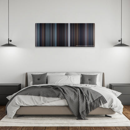 The King's Speech color palette canvas above a bed, between two black pendant lamps