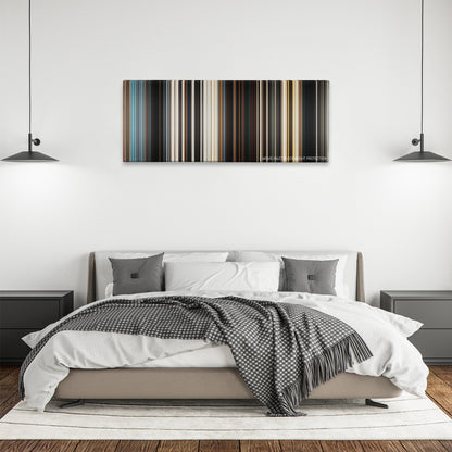 Dune color palette canvas above a bed, between two black pendant lamps