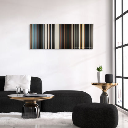 Dune color palette canvas above a black sofa with a gold-topped table