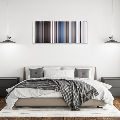 Eternals color palette canvas above a bed, between two black pendant lamps