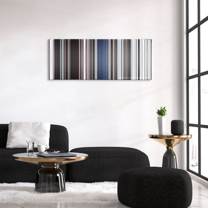 Eternals color palette canvas above a black sofa with a gold-topped table